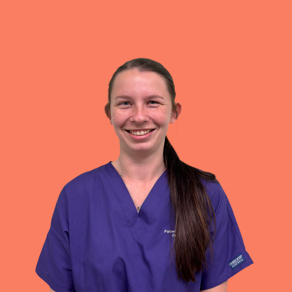 Person in medical scrubs, orange background