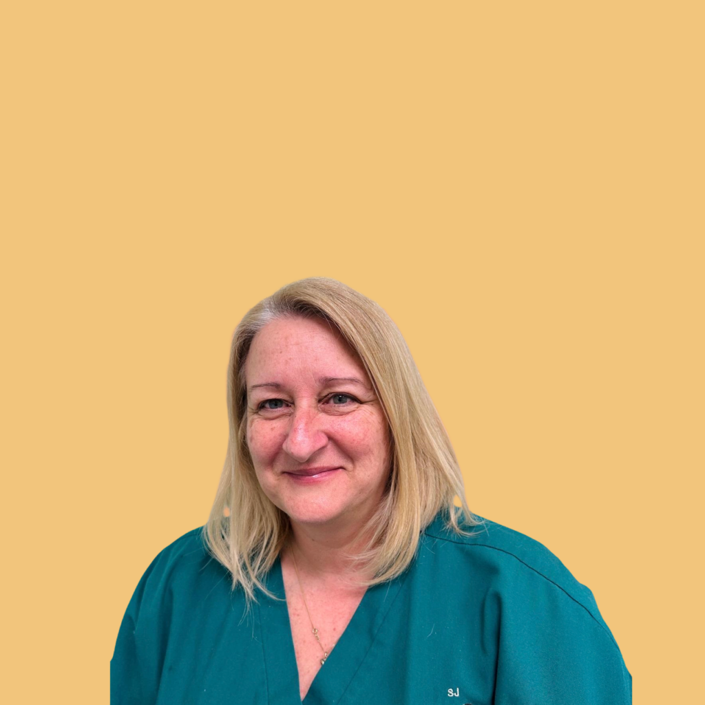 Person in green medical attire.